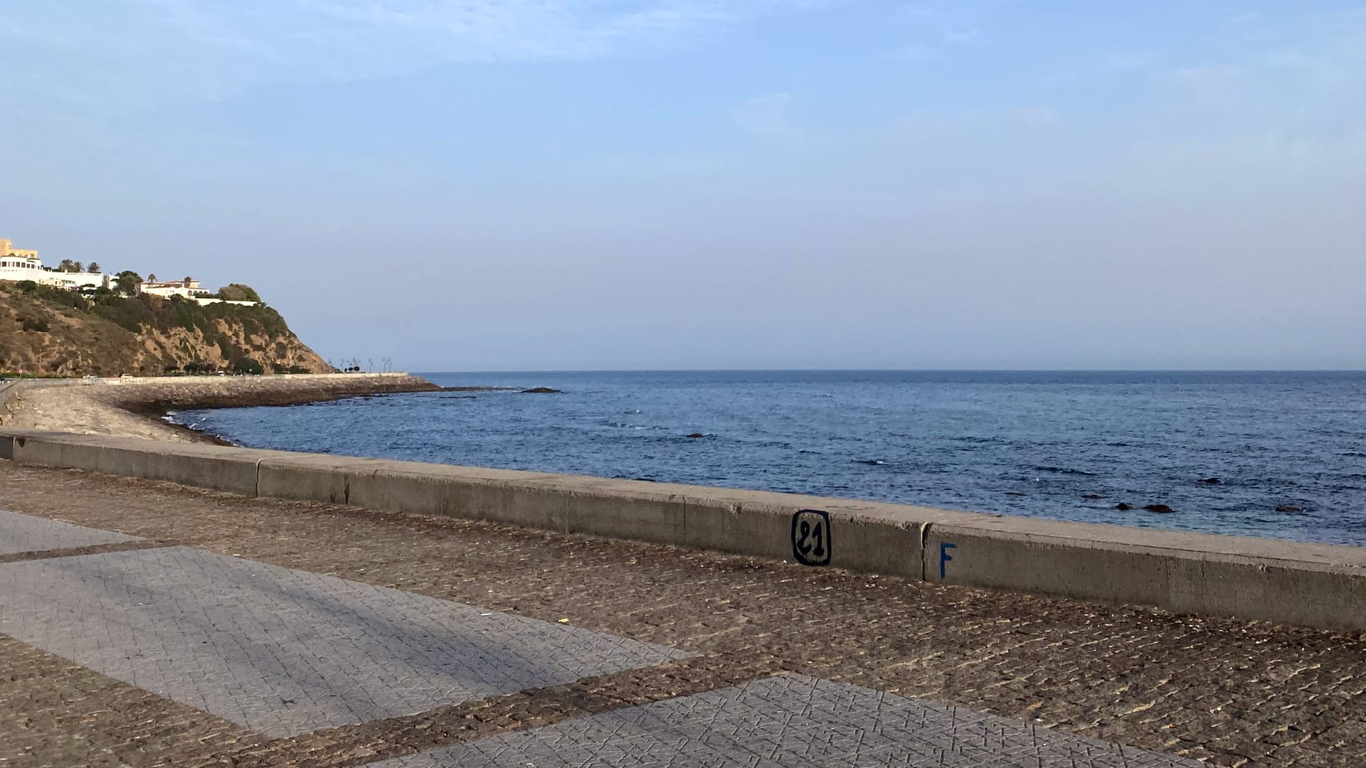 Early morning calm on Tangier’s Corniche, where the curve of the coastline meets the open sea.